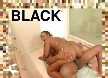 Black fatty riding big cock in bathroom