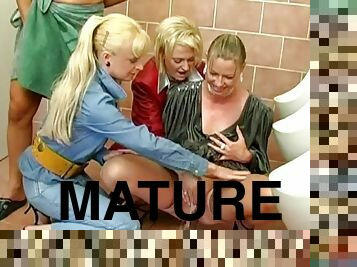 Mature babes got horny sucked the dick and were pissed in a bathroom.