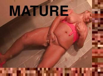 Nasty blonde mature teasing her snatch in the shower