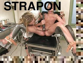 Harmony gets her snatch pounded with a big strapon in BDSM clip