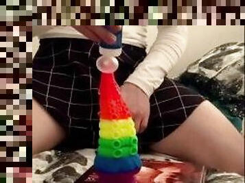 T-Girl riding Large Rainbow Toy in her Petite Ass