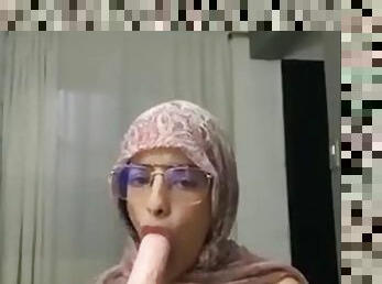 Arab wearing her hijab and having sex with several cocks in an anal way moans with pleasure