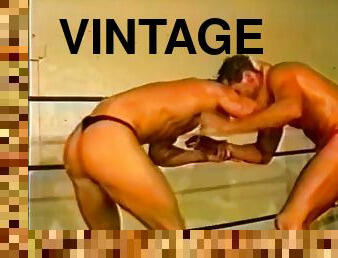 Hard body wrestlers fight and then take a sensual shower