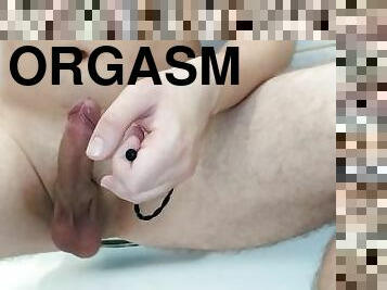 A guy plays with a urethral stimulator - moans, pisses, jerks off and cums