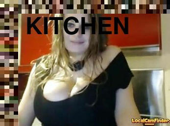 Shaking and oiling big tits in kitchen for webcam show