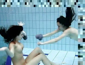 Swimming with sweet naked brunette teens