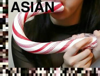 Asmr asian girl sensually licks huge candy cane