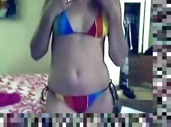 Webcam teen stripping off her tiny and sexy bikini