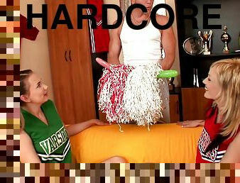 Two horny cheerleaders wear their uniforms while getting fucked