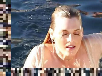 Brigitte Anne fondles her wet body on the poolside