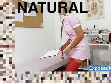 Nicky Angel poses in nurse uniform and masturbates