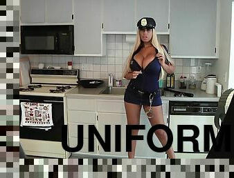 Backstage footage of a sexy police woman in uniform