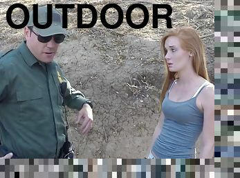 Redhead can get to the USA if she fucks the border patrol outdoors