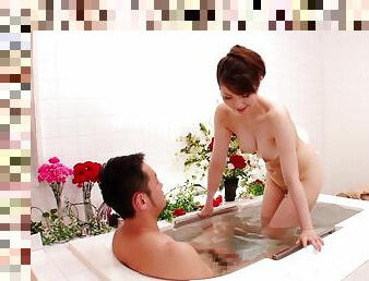 Japanese MILF Yuna Aino sucks and teases a cock while taking bath