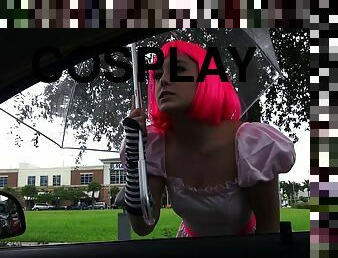 Cosplaying girl with pink hair gets fucked in a car