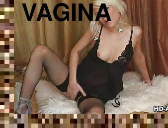 Nice blonde girl in fishnet stockings toys her vagina