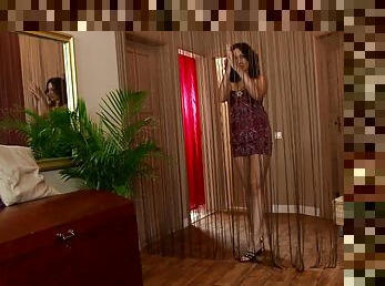 Brunette milf Raffaella enjoys playing with her pussy near a mirror