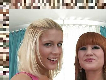 Pretty lesbians Lucy Bell and Sweet Kat enjoy playing with a strapon