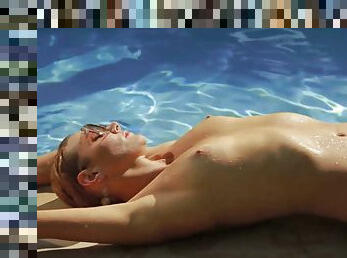 Gorgeous Gia Marie swims then relaxes by the pool nude