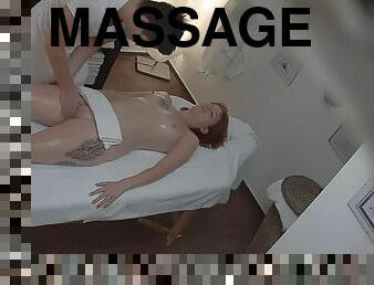 Redhead in a massage parlor