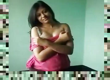 Chubby Indian girls strips in front of a webcam in solo clip