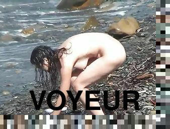 Nude brunette exposed by horny voyeur