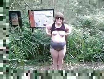 Chubby mature amateur brunette shows her natural tits outdoors