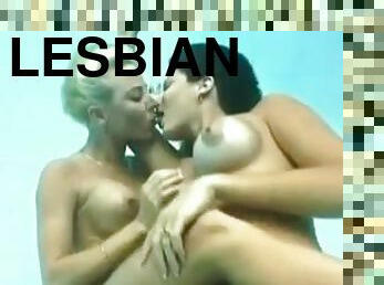 Two horny lesbians make out and scissor in the pool