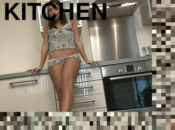 Hot teen with small tits masturbates in the kitchen