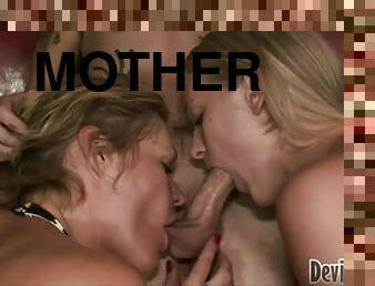 Mother and Daughther Team Up To Blow a Guy in a Hot Threesome