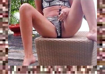 Slutty masturbation outdoors with black toy