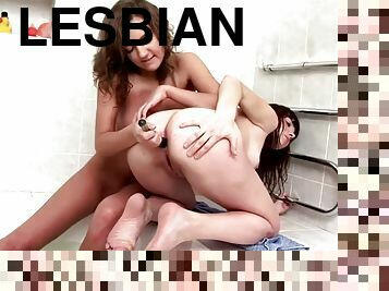 In the bathroom these two European lesbian sluts tried sex toys anally
