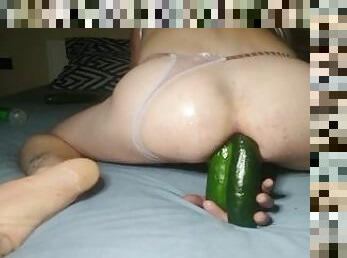 Two cucumbers in the tight ass of a young femboy