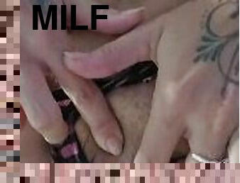 MILF fingering her clit with wet panties