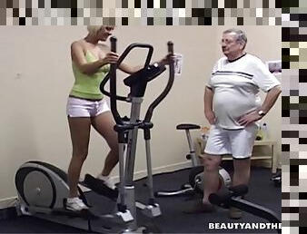 A horny hot blonde fucks an older fat guy at the gym