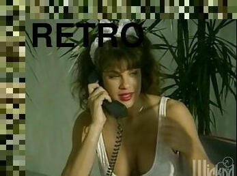 Retro video with ebony Angel Summers posing for a camera