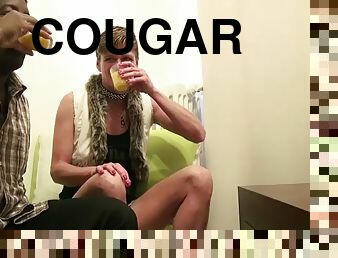 A cougar has fun with a shy black