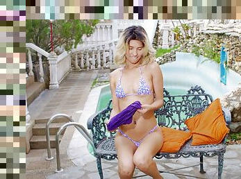 Outdoors solo video of cute Mayo Villegas playing in the pool