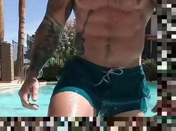 Inked daddy hunk shows off dickprint & muscles at the pool