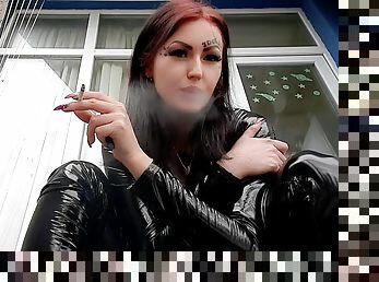 Cigarette smoke. Smoking fetish. Dominatrix Nika smokes 2 cigarettes on the balcony. Smoke fetish and smoking mistress 