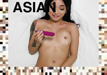 Solo Asian chick Avery Black spreads legs to masturbate with a dildo