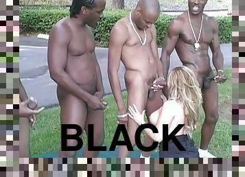 Holly gets face-fucked and sandwiched by many black dudes outdoors