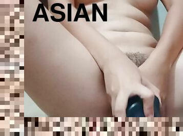 Horny pinay riding a 7 inches dildo
