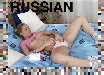 Cute Russian teen in pink sucking cock