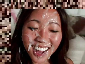 Nasty Asian babe Lei Li gets two hard cocks in her mouth