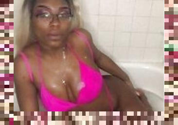 Ebony smoking milf strips in bathtub