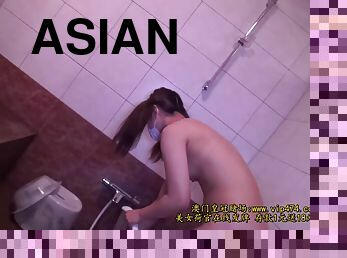 Asian cutie takes a hot shower before getting fucked