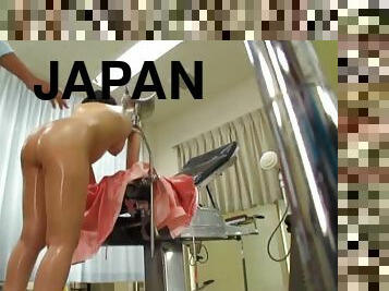 Her fully lubed up Japanese body is sexy as the doctor plays