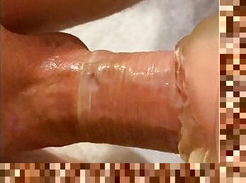 Teen fucks fleshlight with condom