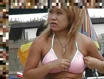 Japanese girls at the beach with big tits